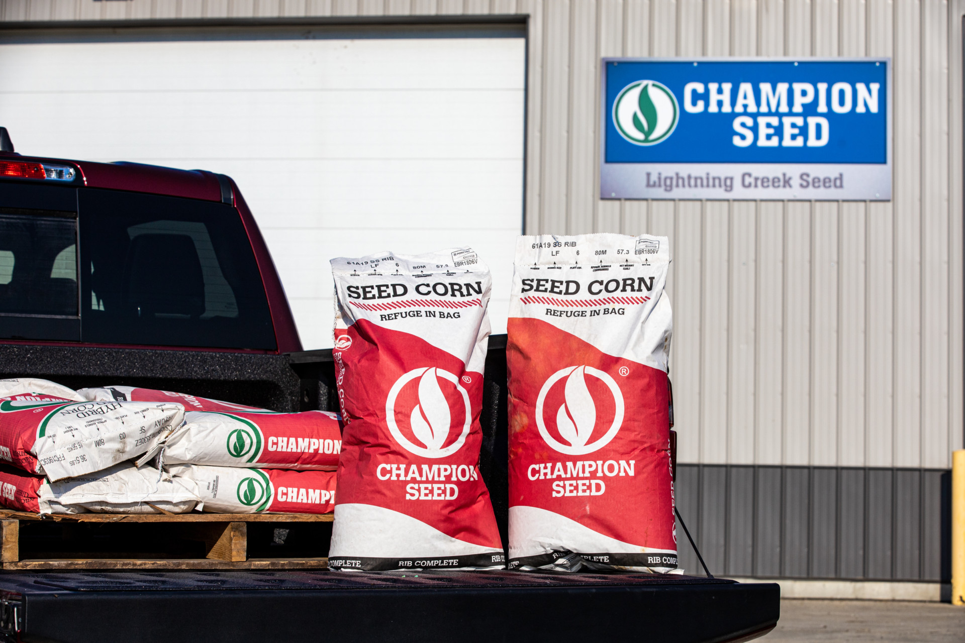 Champion Seed Corn Bags on a Truck Bed at a Seed Dealer